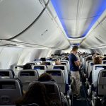 Is it safe to fly with your baby on your lap? Parents and experts weigh in