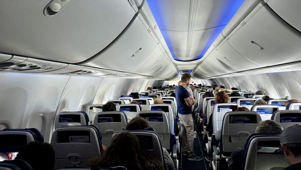 Is it safe to fly with your baby on your lap? Parents and experts weigh in